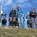 ITEX'ers look around at plants on mountain.
